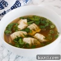 How to Make Authentic Wonton Soup 5 A bowl of soup, with Wonton