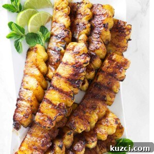 Cinnamon Sugar Grilled Pineapple Recipe 6 Cinnamon sugar grilled pineapple on a platter.