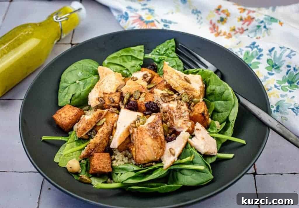33 Fall Dinner Recipes Packed With Comfort Food Favorites 9 Salmon bowl on a black plate.