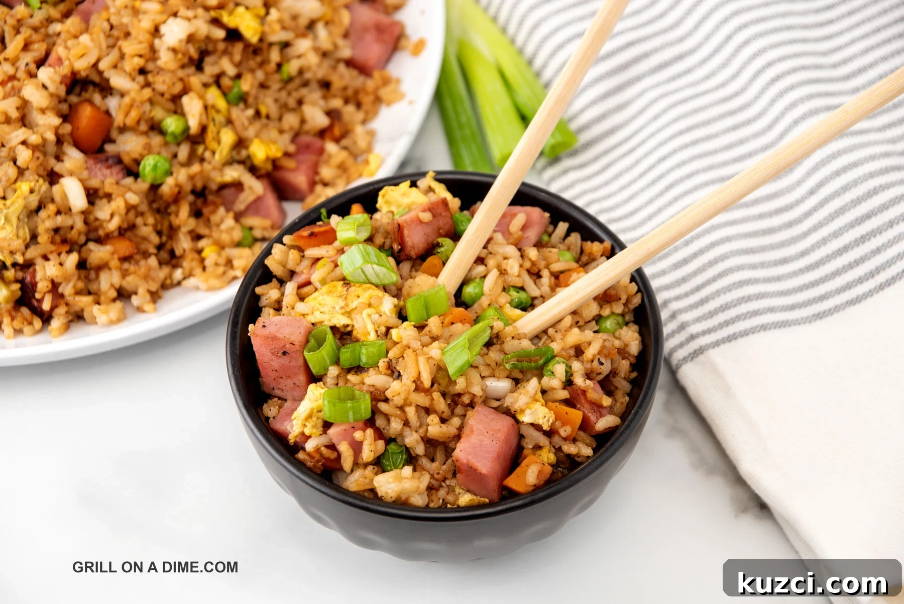 Savory Ham Fried Rice with Eggs and Vegetables 2 Ham Fried Rice in a bowl with chopsticks