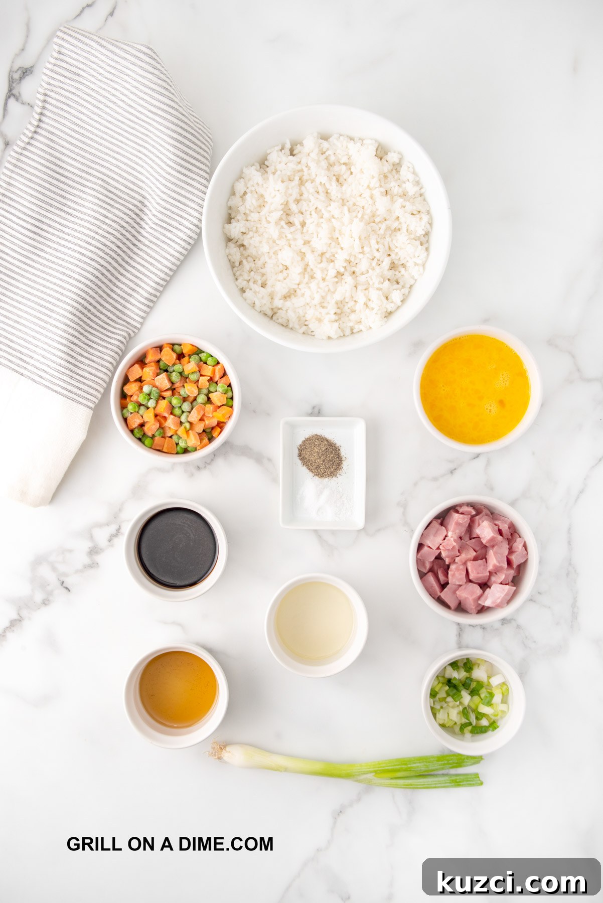 Savory Ham Fried Rice with Eggs and Vegetables 3 Ingredients needed for Ham Fried Rice - ham, sesame oil, vegetable oil, rice, soy sauce, salt, pepper, frozen peas and carrots, eggs, green onions