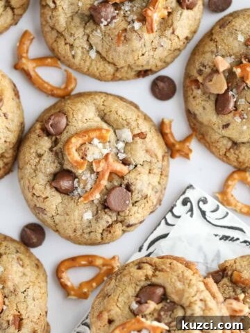 kitchen sink cookies spread out on a white surface.