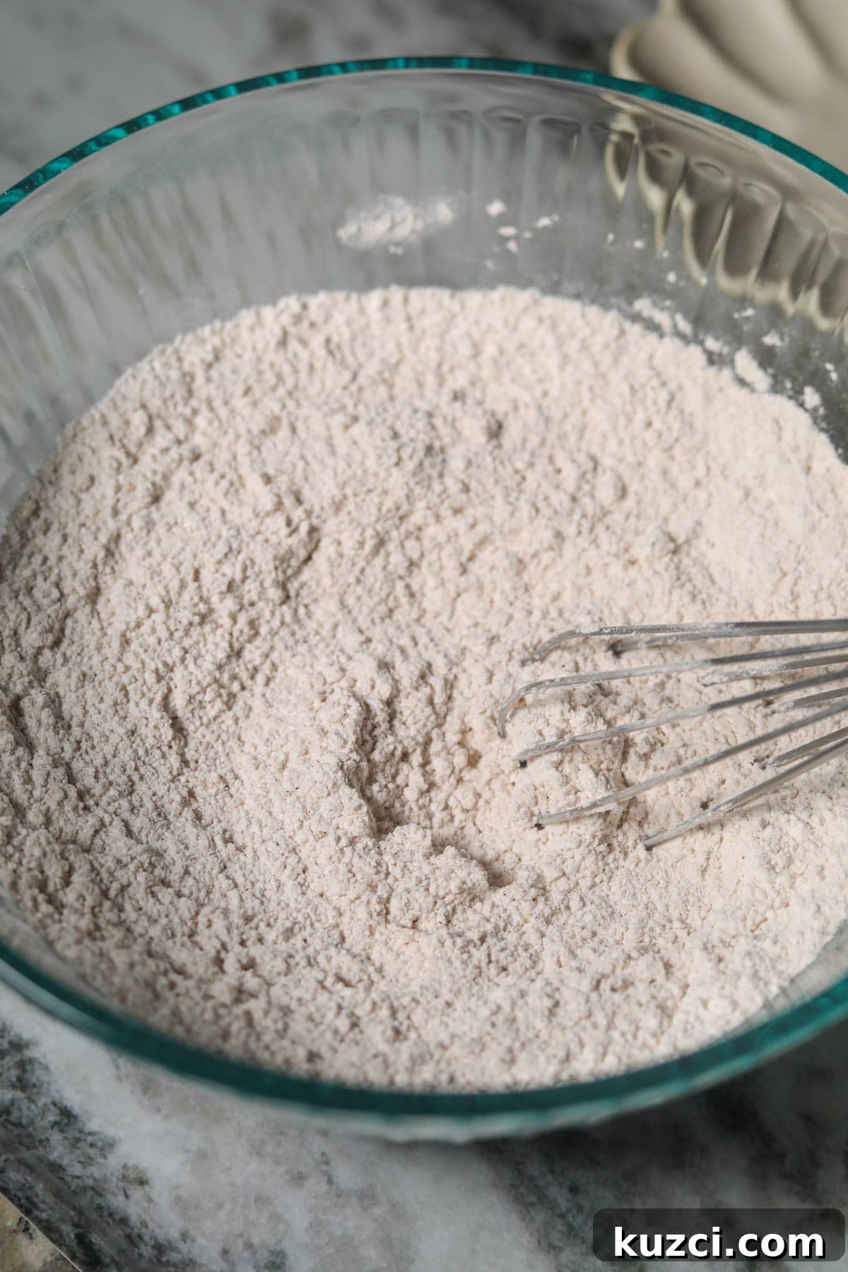 Cardamom Butter Cookies Recipe 4 dry ingredients for pecan bundt cake in a bowl.