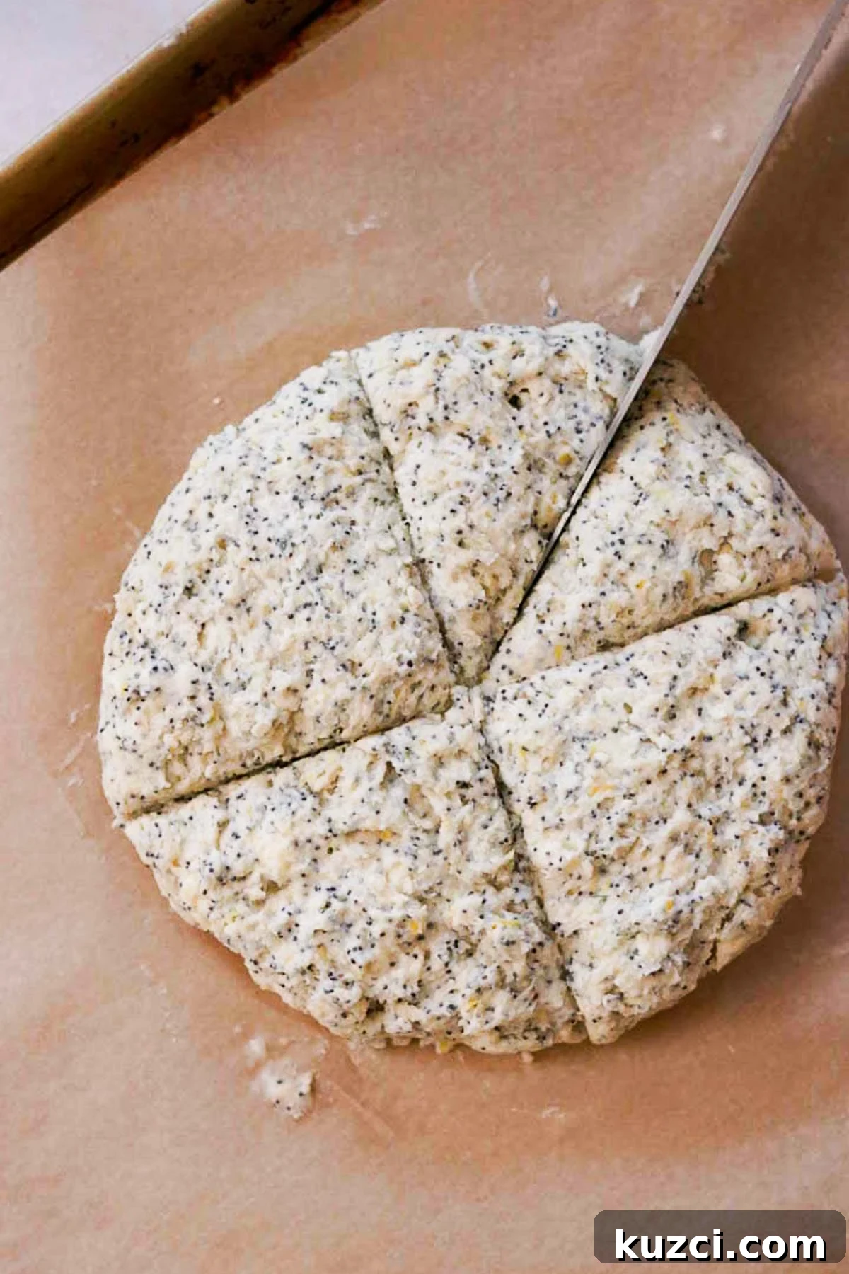 Lemon Poppy Seed Scones with Zesty Glaze 10 cut scones into wedges