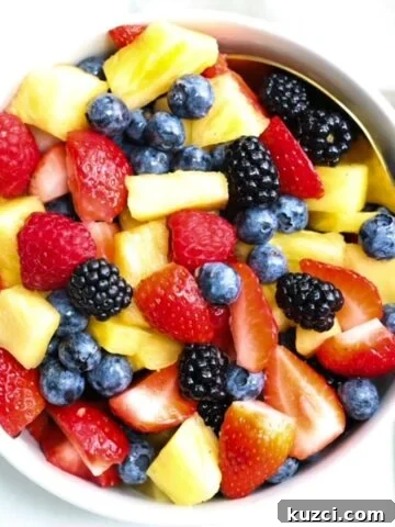Top view of a bowl of fresh fruit salad.