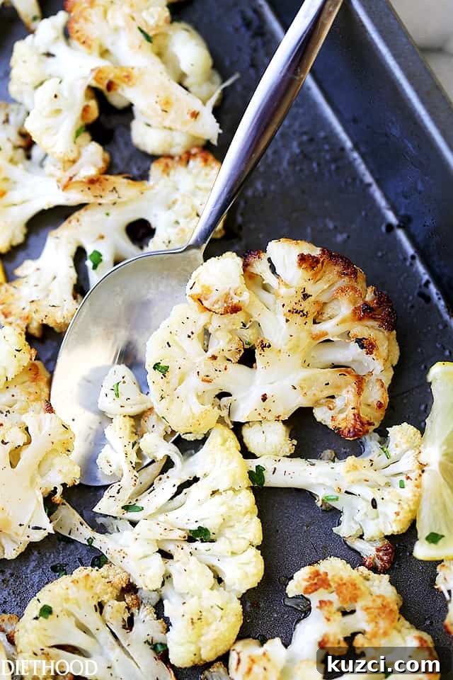 Make crispy roasted cauliflower tossed in olive oil and seasoned with lemon zest, paprika, and thyme. An easy, flavorful vegetable side dish! Lemon Paprika Roasted Cauliflower Recipe - Tender roasted cauliflower tossed in olive oil, seasoned with a delicious lemon-paprika mixture, and roasted to a perfect golden brown.