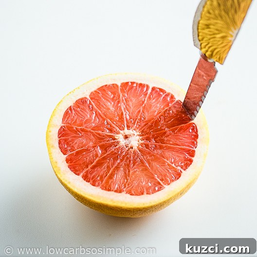Dairy Free Shrimp Avocado Red Grapefruit Salad 4 Image of Shrimp Avocado and Red Grapefruit Appetizer; Cutting the Grapefuit | Low-Carb, So Simple
