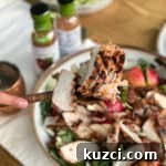 Grilled chicken over fall harvest salad