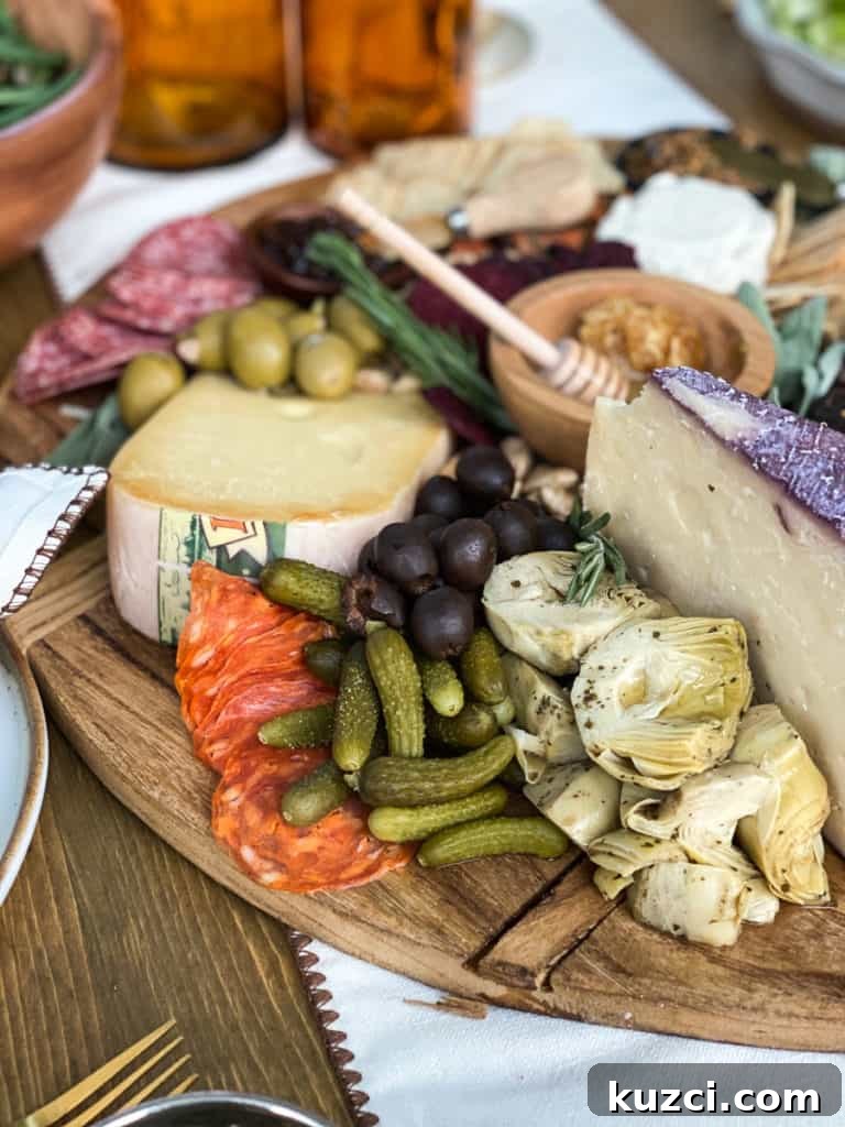Apple Cider Chicken Marinade and Fall Harvest Dinner Party Charcuterie board with olives, cheese and meats