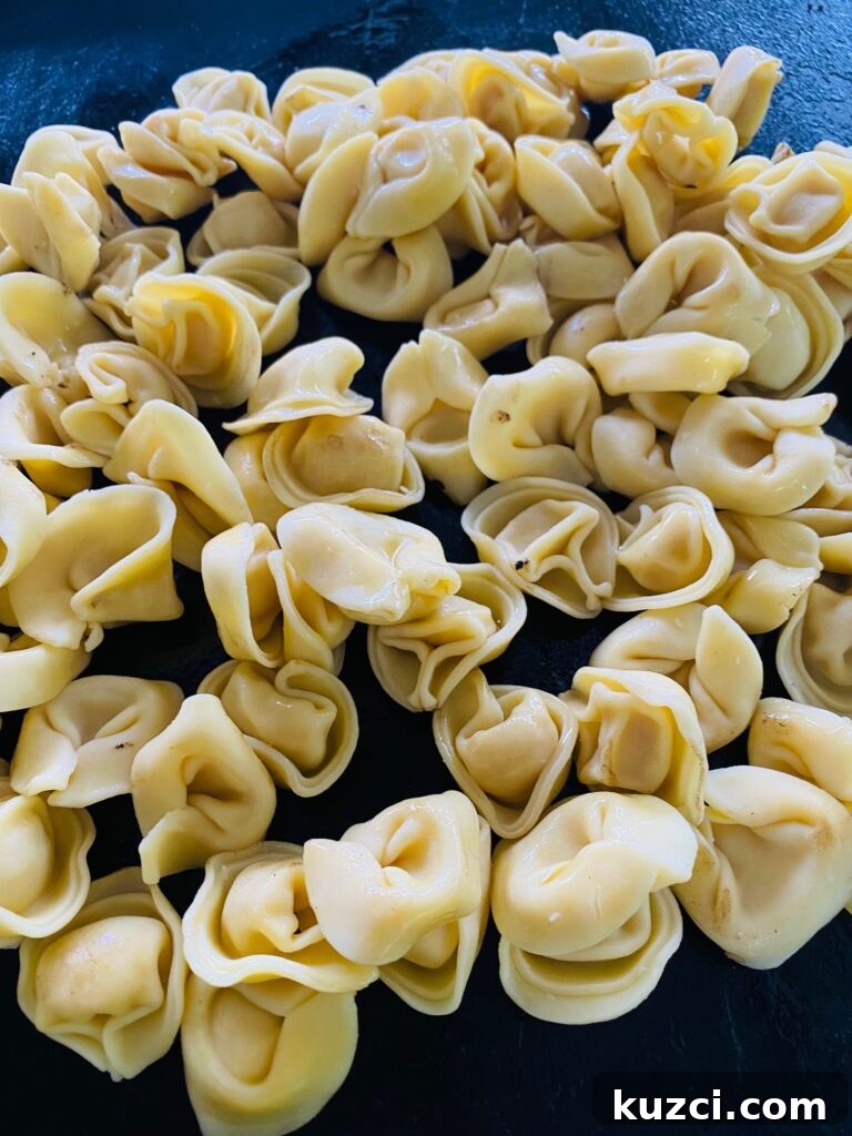 Blackstone Shrimp Tortellini with Red Pepper Sauce 5 tortellini on the griddle before cooking