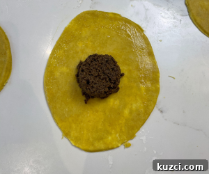 Placing filling into dough