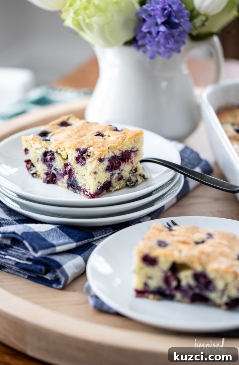 Moist Blueberry Cake Recipe with Lemon Glaze 10 blueberry dessert on white plates
