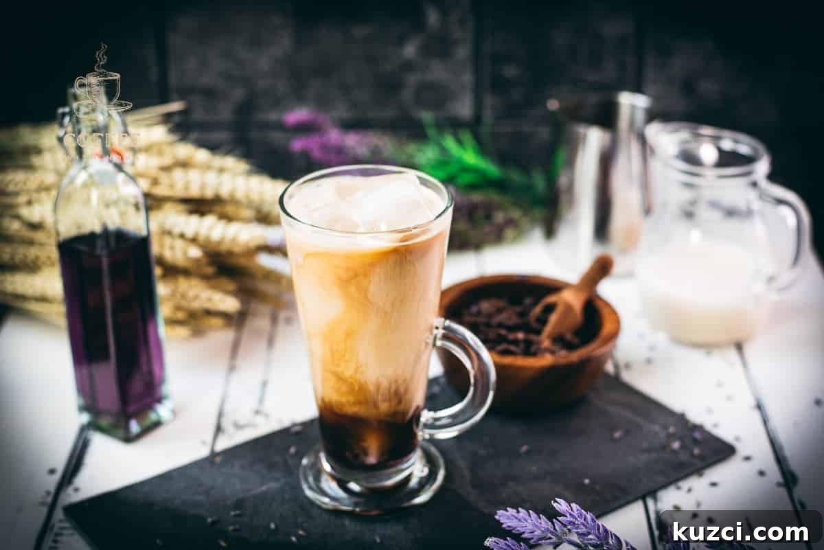 Iced lavender latte in a glass.