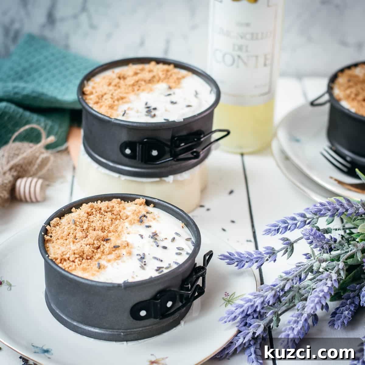 Mini no-bake cheesecakes with lavender and limoncello served on floral plates.