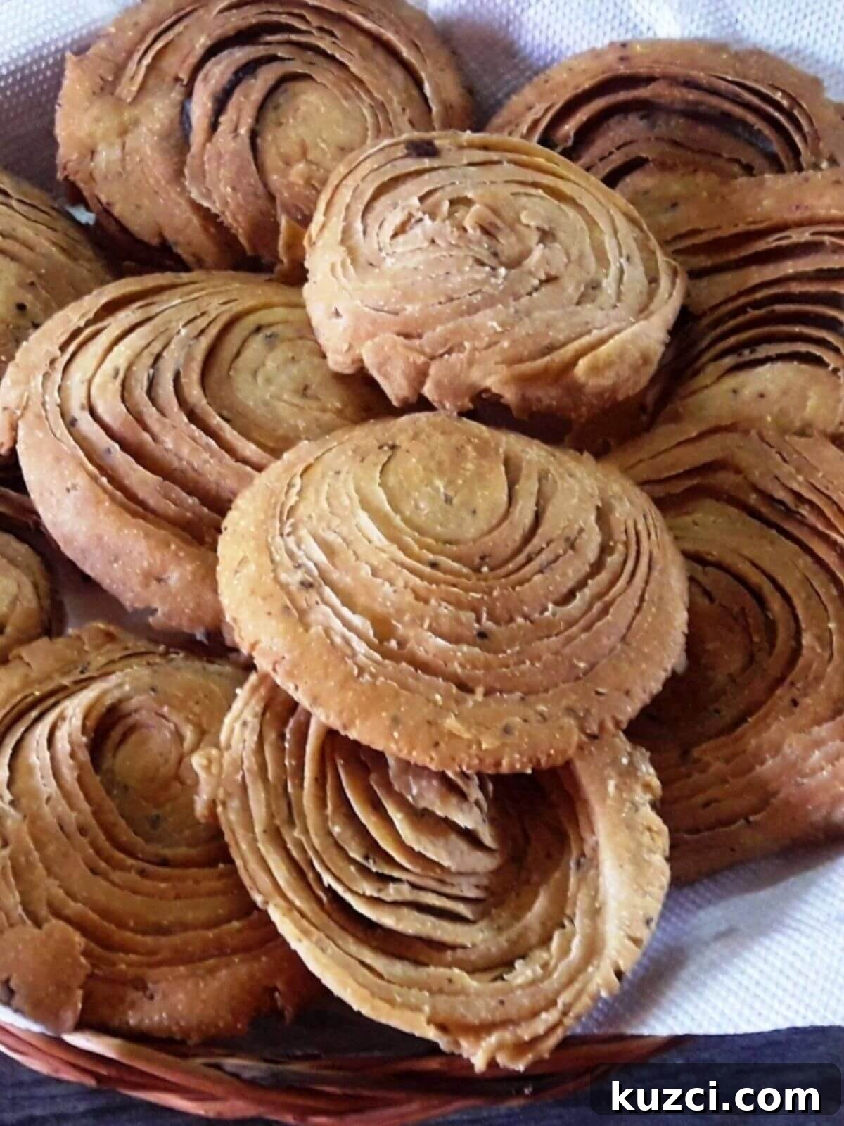 Verki (Varki) Puri Recipe: Layered Gujarati Puris 2 close-up of verki puri served in a bamboo basket.