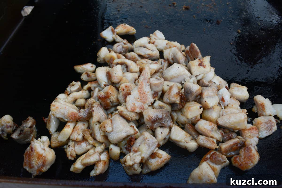 Blackstone Chicken Fried Rice Recipe 5 cooked chicken thigh on blackstone griddle