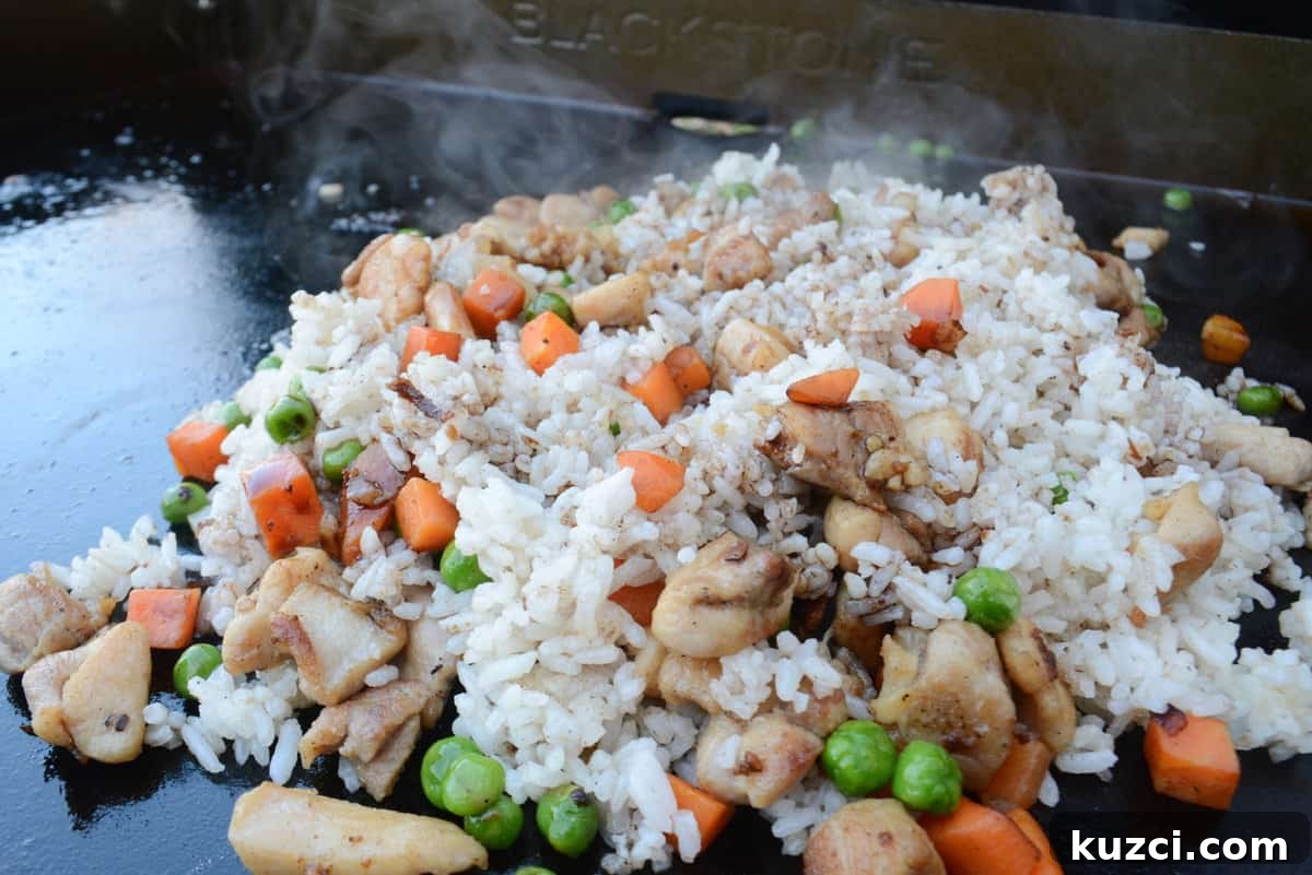 Blackstone Chicken Fried Rice Recipe 9 chicken fried rice cooking on blackstone