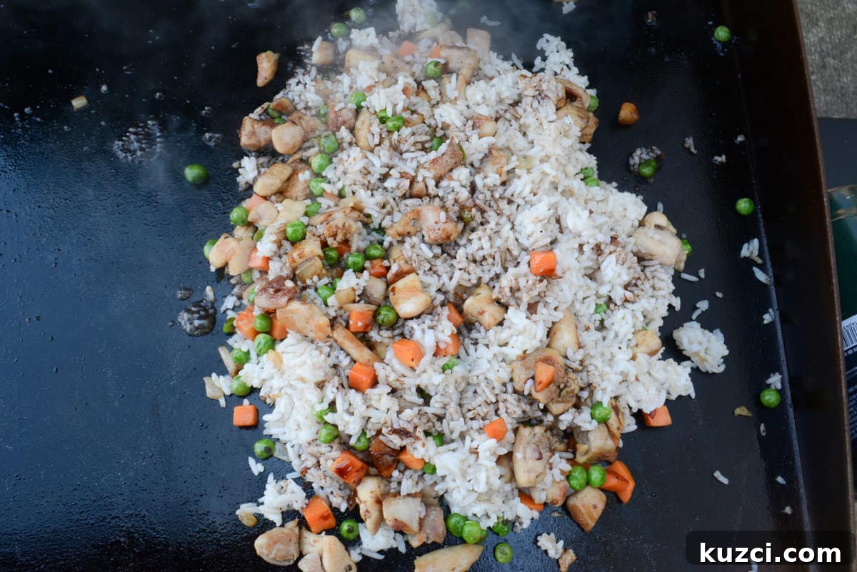Blackstone Chicken Fried Rice Recipe 10 chicken fried rice, cooking on blackstone