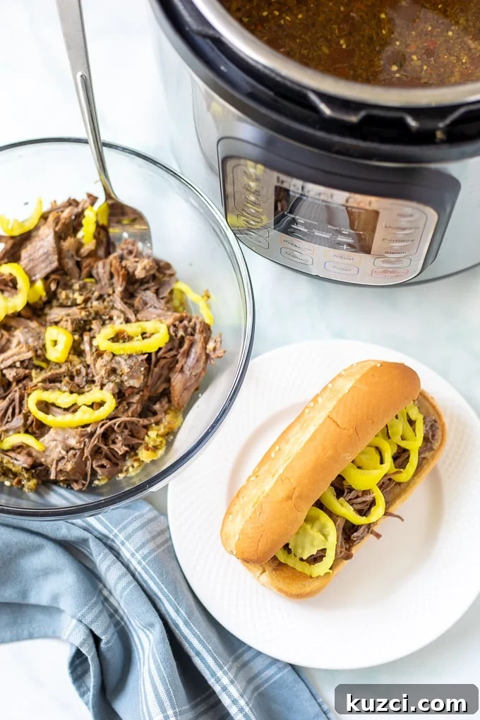 Bowl of Shredded Instant Pot Italian Beef next to Italian Beef Sandwich next to Instant Pot.