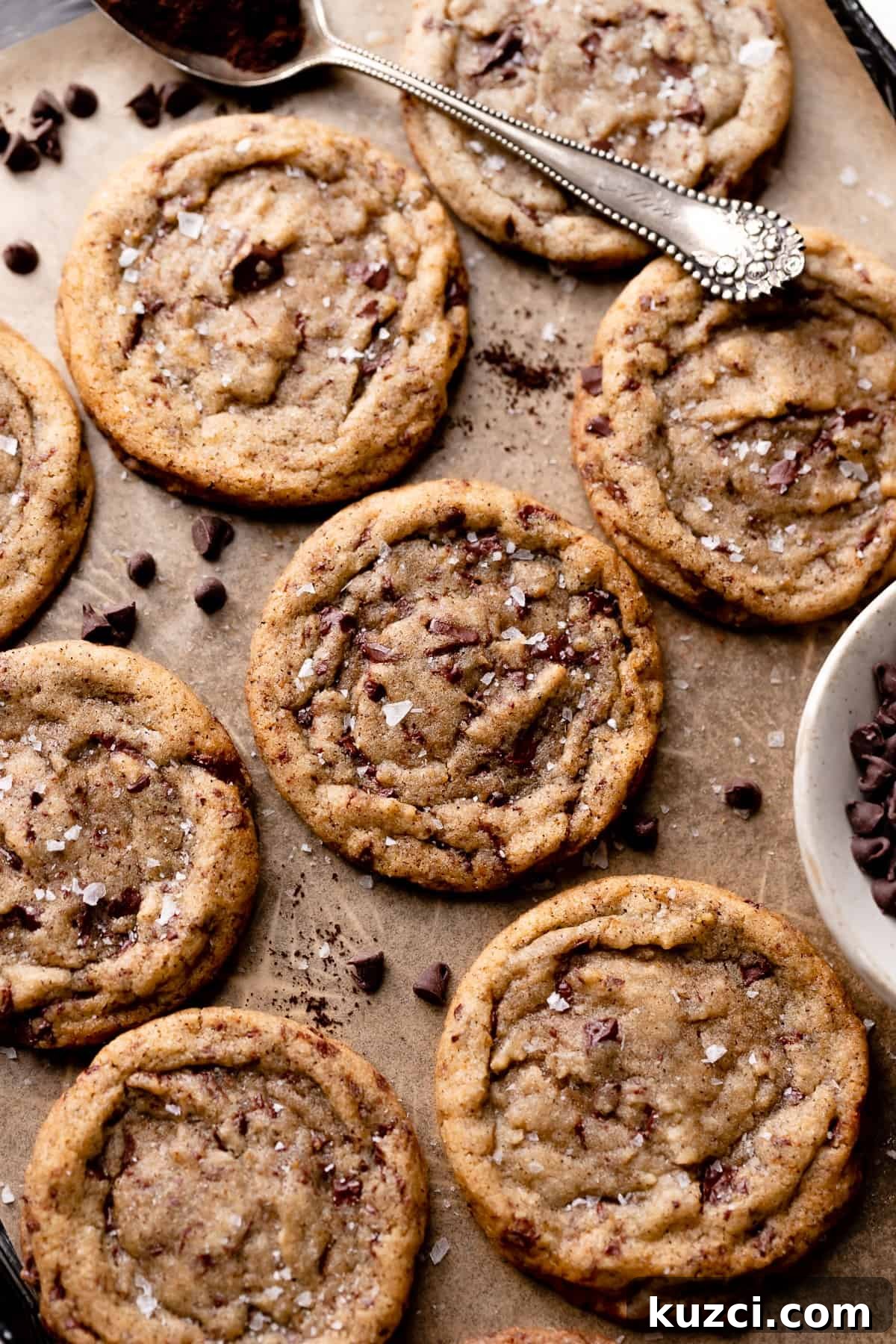 Chewy Espresso Chocolate Chip Cookies 2 espresso chocolate chip cookies topped with flaky sea salt.