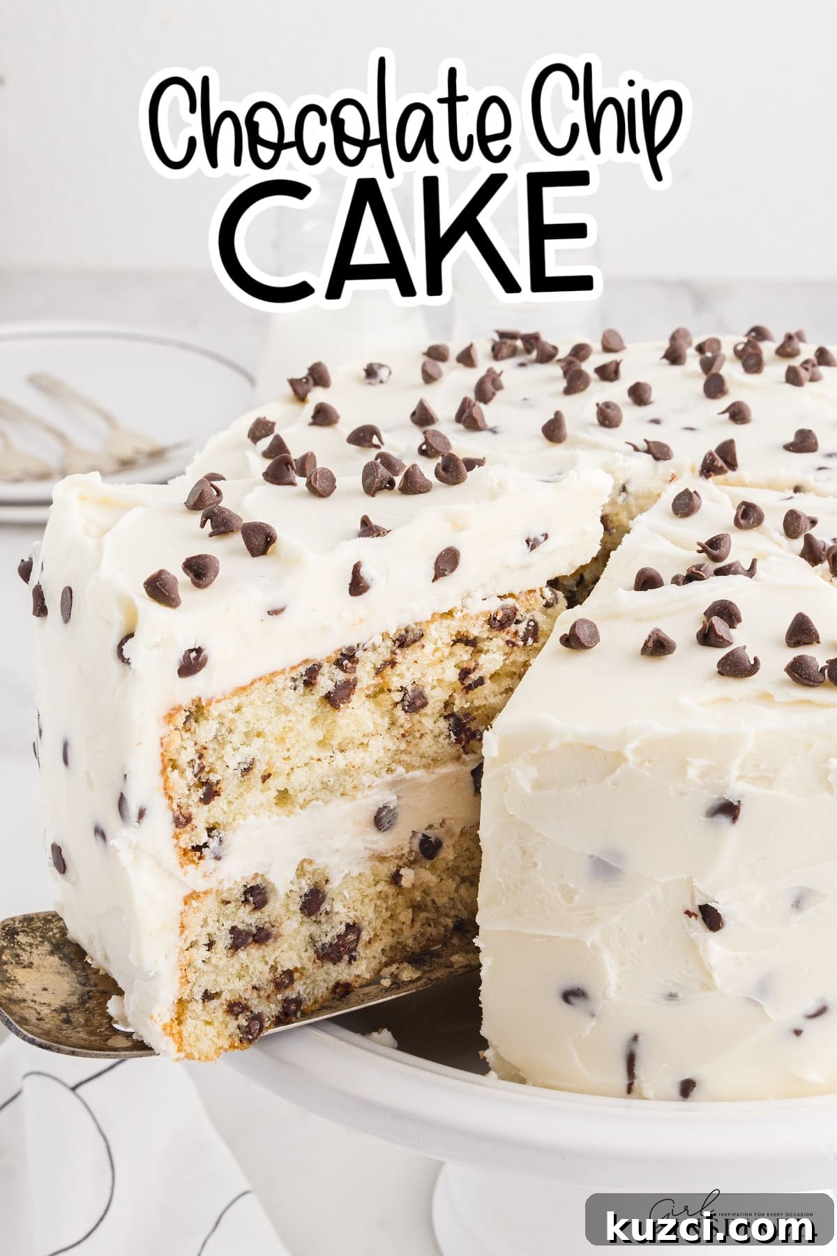 Moist Chocolate Chip Cake Recipe 2 Whole Chocolate Chip Cake on a platter, with a slice taken out of it to show the inside of the cake, with text overlay.