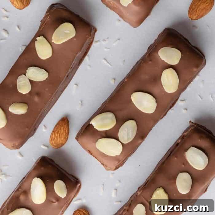 No-Bake Coconut Chocolate Bar Recipe 9 Candy bars topped with almonds