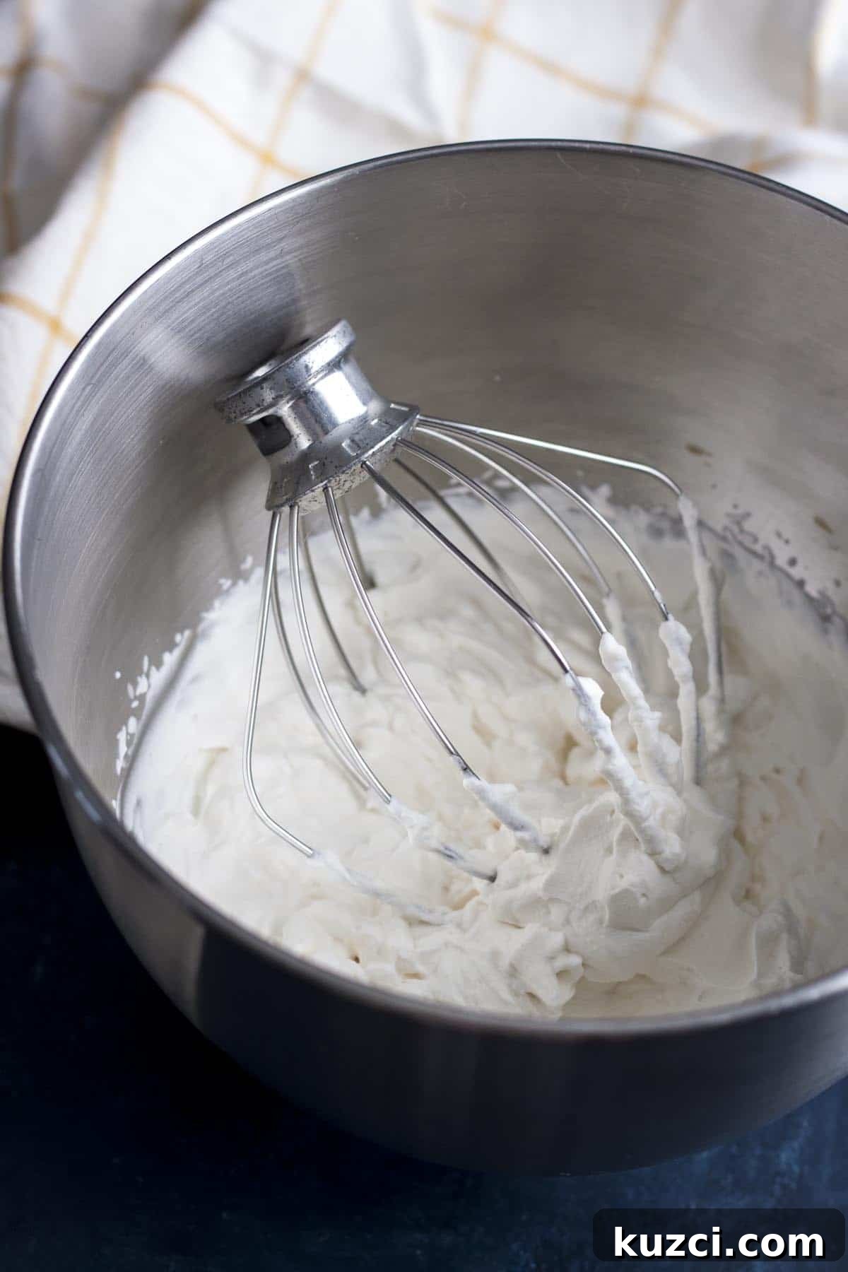 Homemade Whipped Cream Recipe in 5 Minutes 5 Homemade whipped cream in the mixing bowl.