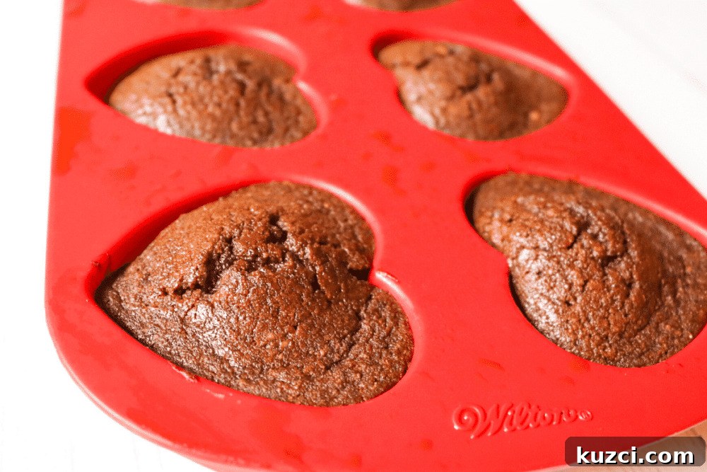 Keto Chocolate Flaxseed Muffins Recipe 2 Keto Chocolate Flaxseed Muffins in red heart silicone baking pan