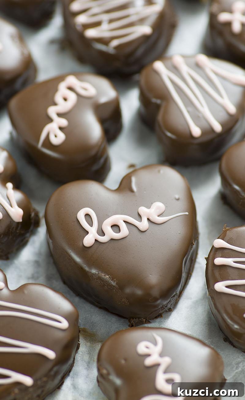 Chocolate Chip Cookie Dough Valentine's Heart Cookies 5 Chocolate chip Cookie Dough Valentine’s Hearts are irresistible cupid inspired dessert. Chocolate, peanut butter and cookie dough in the shape of a heart - do I need to say more?