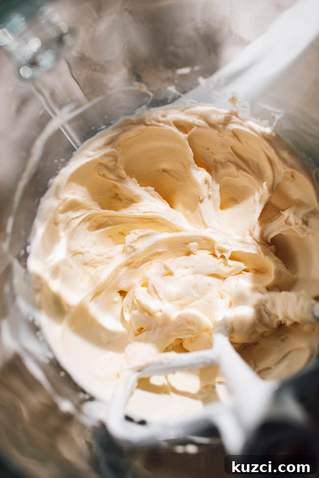 Cheesecake filling spread over graham cracker crust