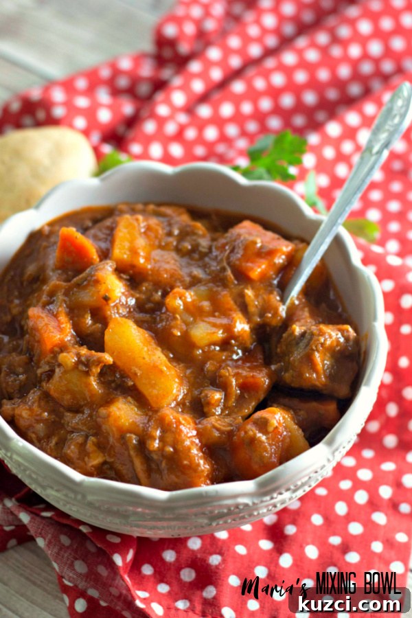Slow-Simmered Beef Stew Recipe with Root Vegetables 6 stew with spoon