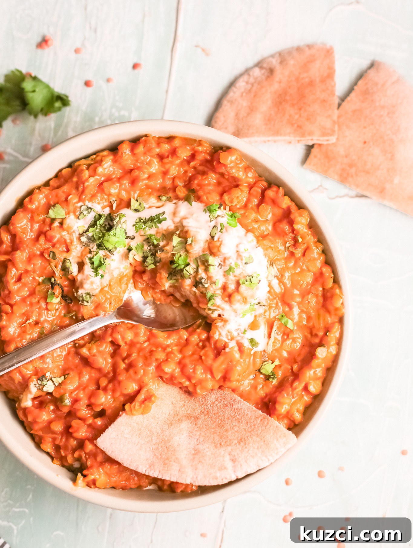 Creamy Red Lentil Curry Recipe: Spiced Indian Dal 14 Red Lentil Curry with spoon.