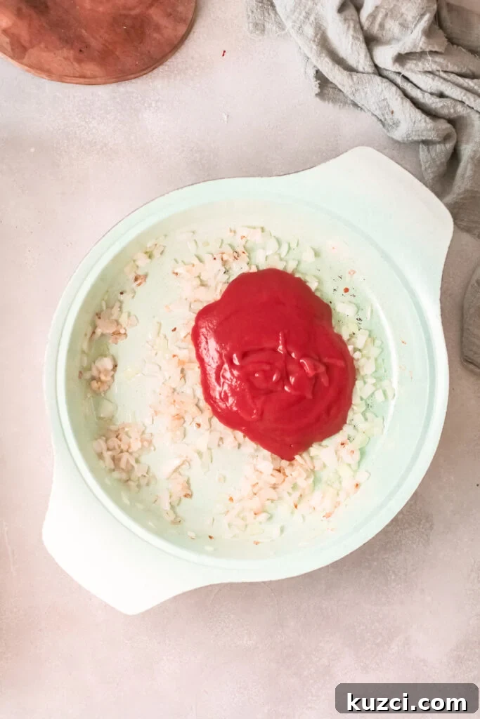 Creamy Red Lentil Curry Recipe: Spiced Indian Dal 5 Red Lentil Curry with tomato sauce.