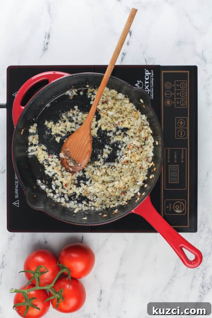 15-Minute Homemade Marinara Sauce for Pasta 6 Cooked onions and garlic in a cast iron skillet.