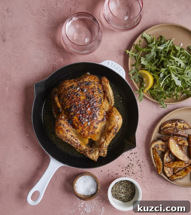 Turn One Roasted Chicken into 2 Weeknight Dinners 3 roasted chicken next to arugula salad and roasted potato wedges