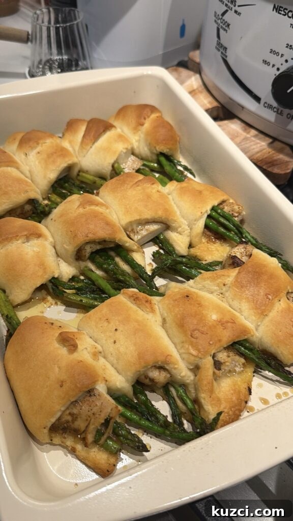 Chicken Asparagus Croissant Casserole 7 Crescent rolls wrapped around chicken and asparagus