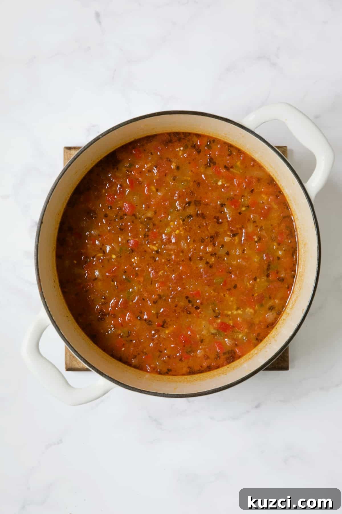 Creamy Shrimp and Corn Soup Recipe 9 Soup in white Dutch oven.