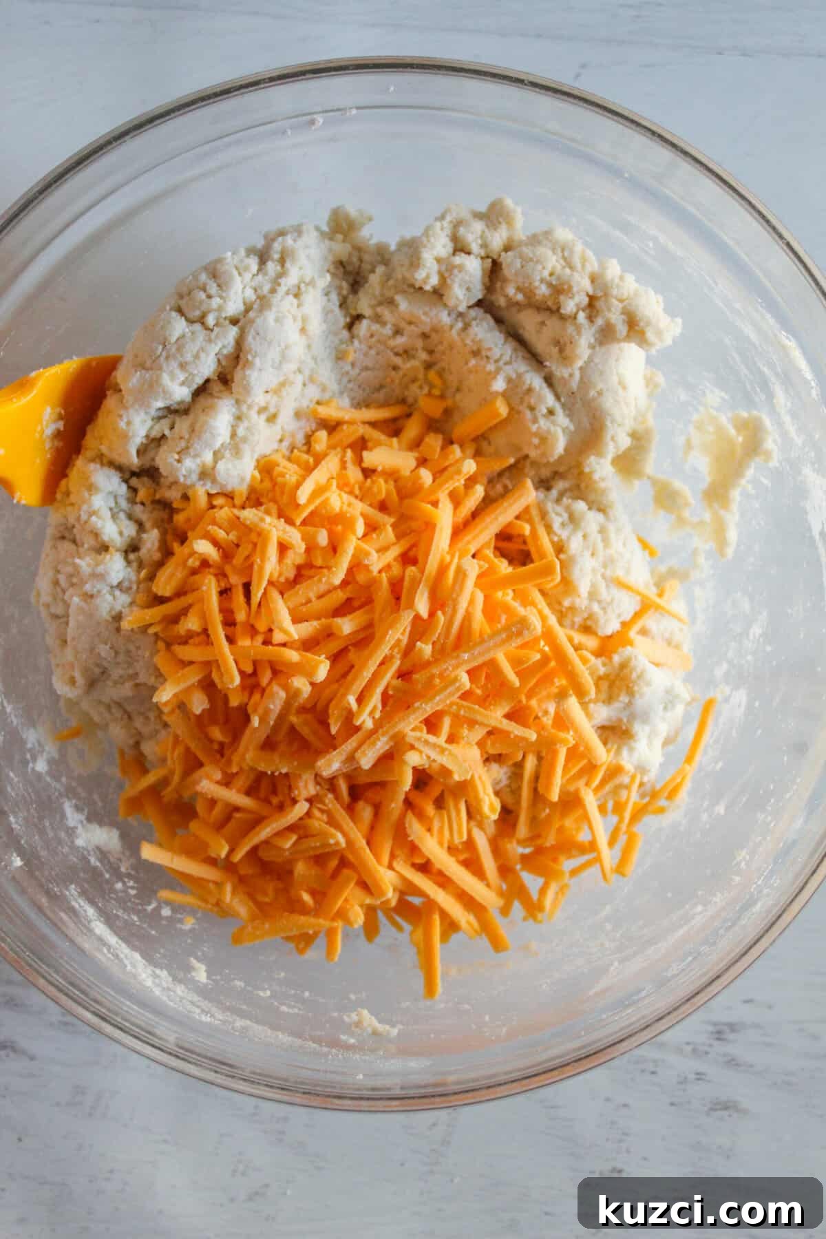 Gluten Free Dairy Free Cheddar Bay Biscuits Copycat 8 shredded vegan cheddar cheese added to biscuit dough.