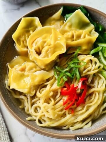 A bowl of wonton noodle soup
