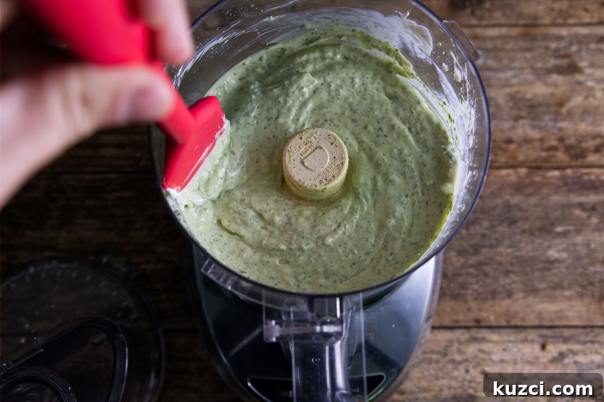 Avocado Lime Crema Recipe 6 Crema sauce after mixing in food processor.