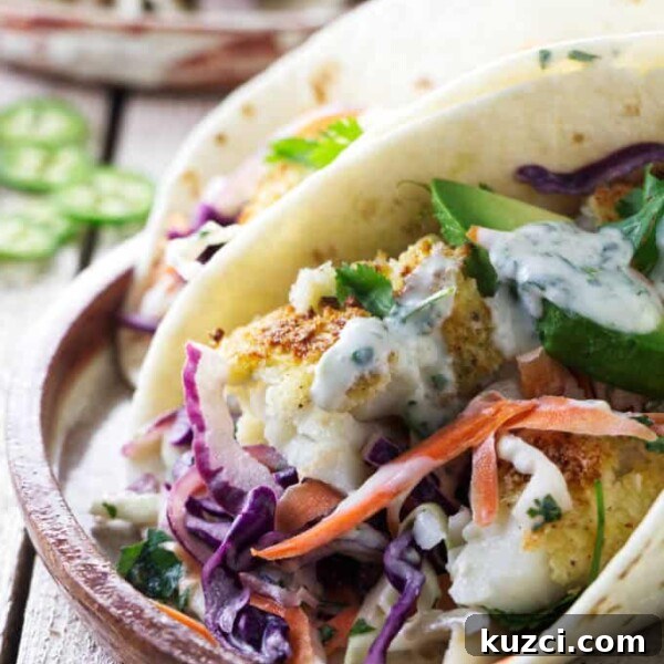 Avocado Lime Crema Recipe 7 Close up of tilapia tacos showing the air fryer tilapia