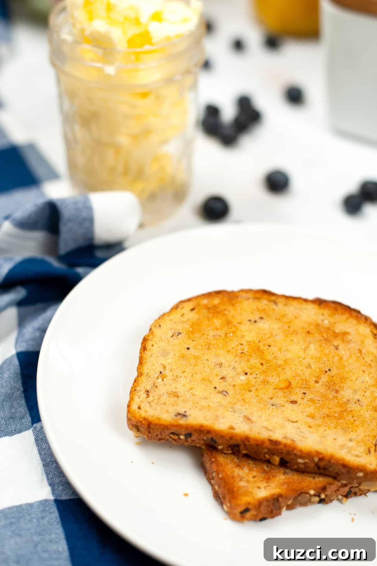 toast with homemade butter in jar in background