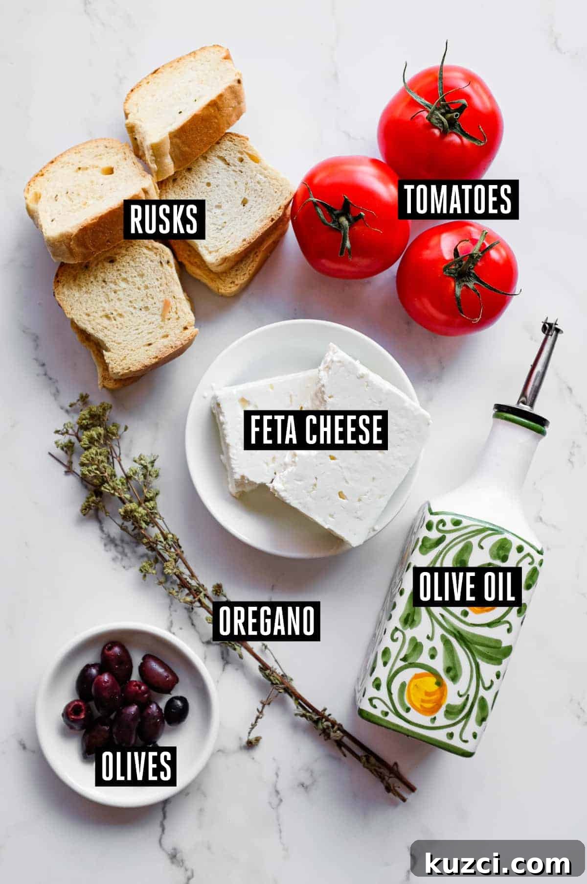 Cretan Dakos Salad | cookeatworld.com Mediterranean dakos platter with Greek olives and dried oregano