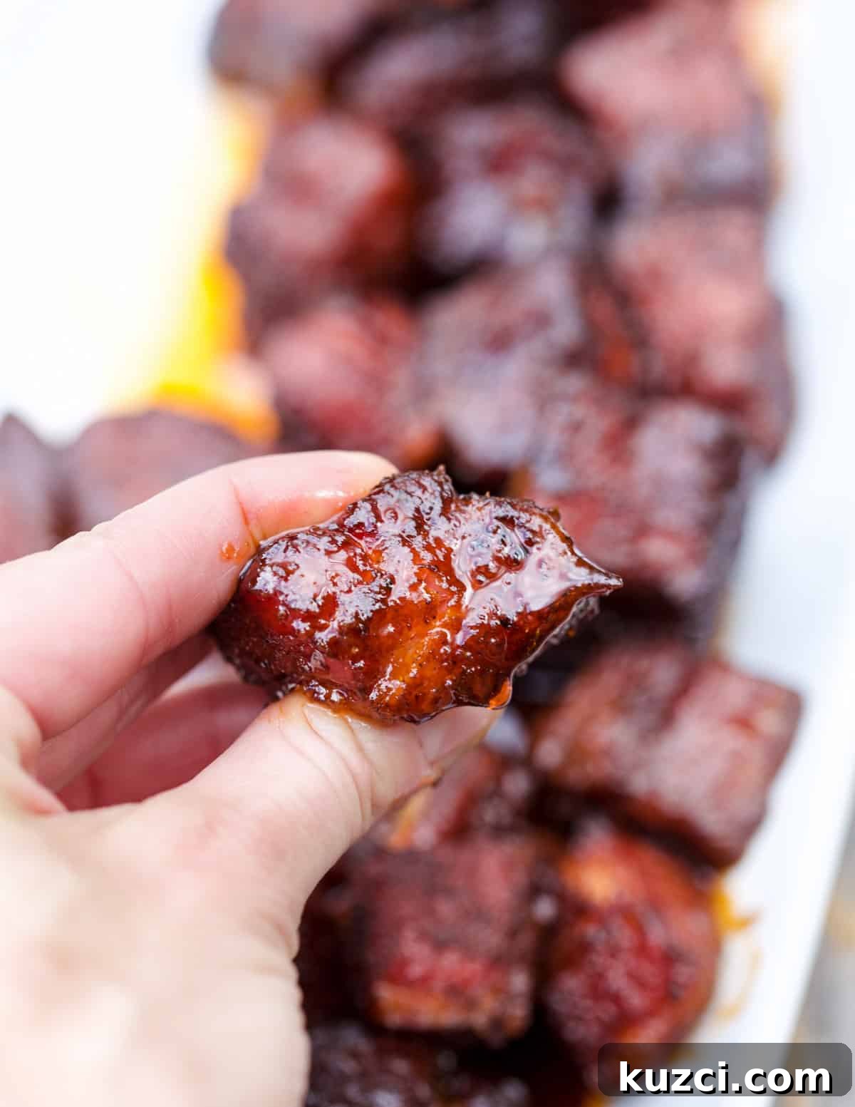 Smoked Pork Belly Burnt Ends: How to Make Sticky, Crispy Bites 2 A piece of Pork Belly Burnt Ends