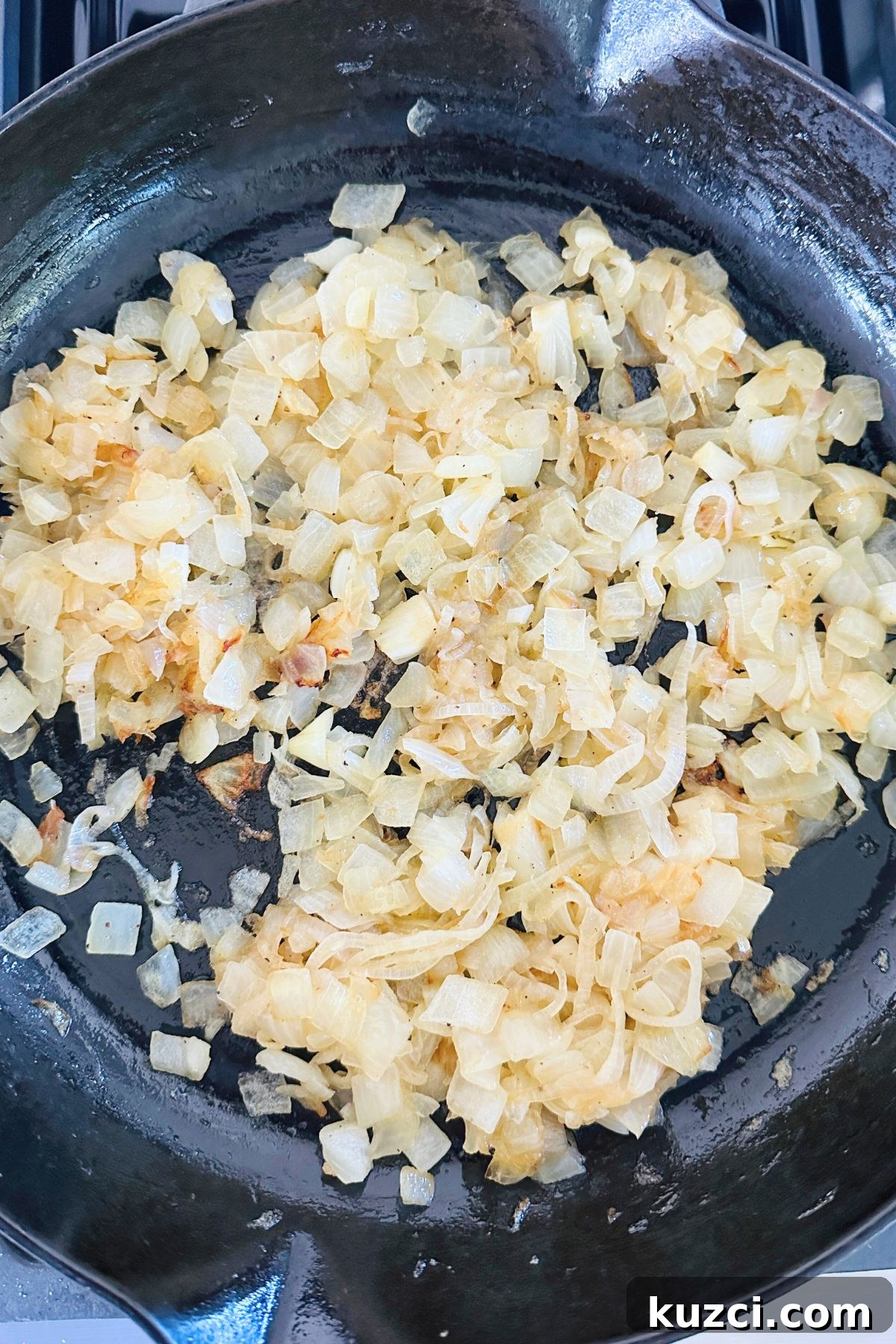 Creamy Baked Onion Dip Recipe with Caramelized Onions 4 Olive oil, chopped onions, and shallots in a large skillet on the stove.