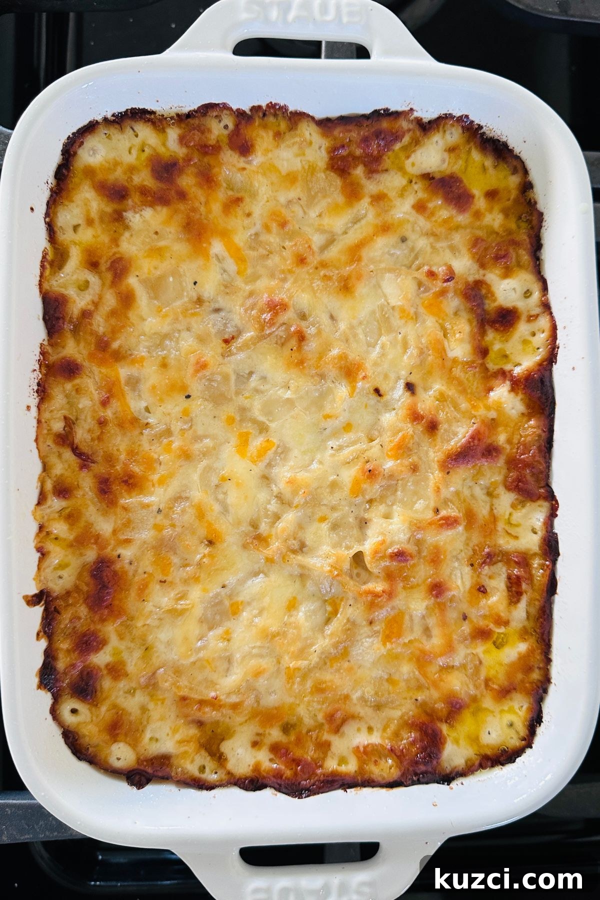 Creamy Baked Onion Dip Recipe with Caramelized Onions 9 Hot onion dip fresh from the oven with golden brown edges.