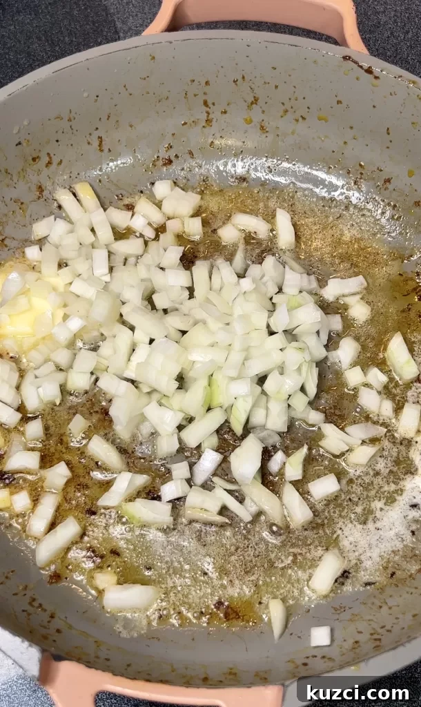 Diced onion in skillet