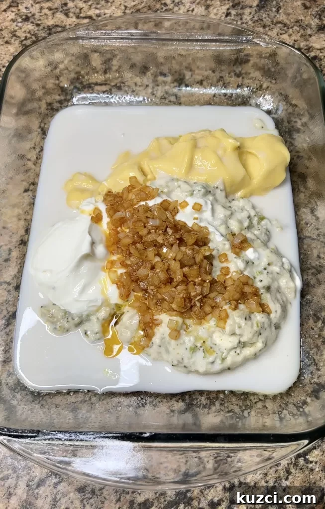 Creamy Chicken Divan mixture in baking dish