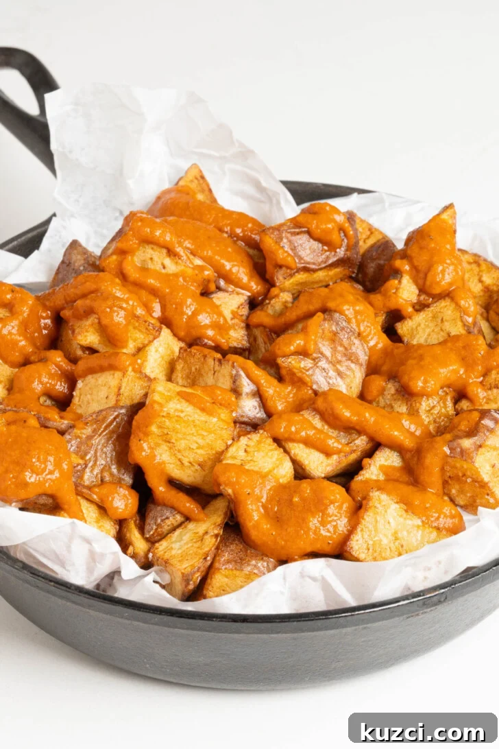 Patatas Bravas Recipe with Spicy Spanish Potatoes 9 A pan of patatas bravas.