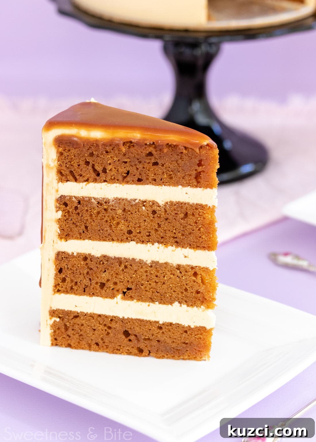 Caramel Mud Cake Recipe with Gluten Free Option 4 Close up of a slice of caramel mud cake with three layers of caramel buttercream.